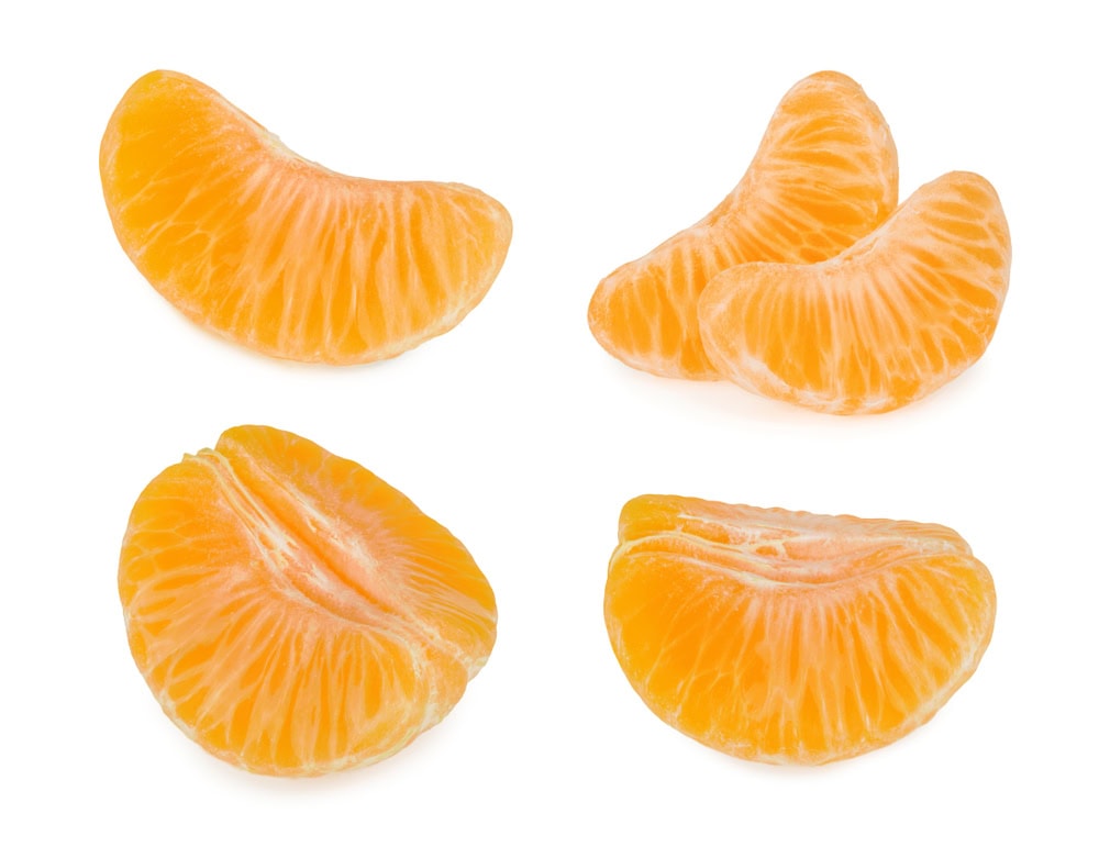 Tangerine slices isolated on white background