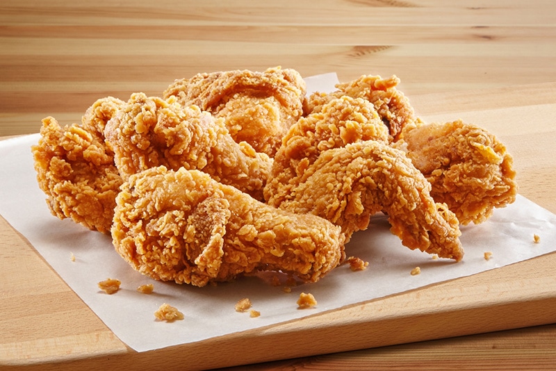 crispy fried chicken in a wooden table