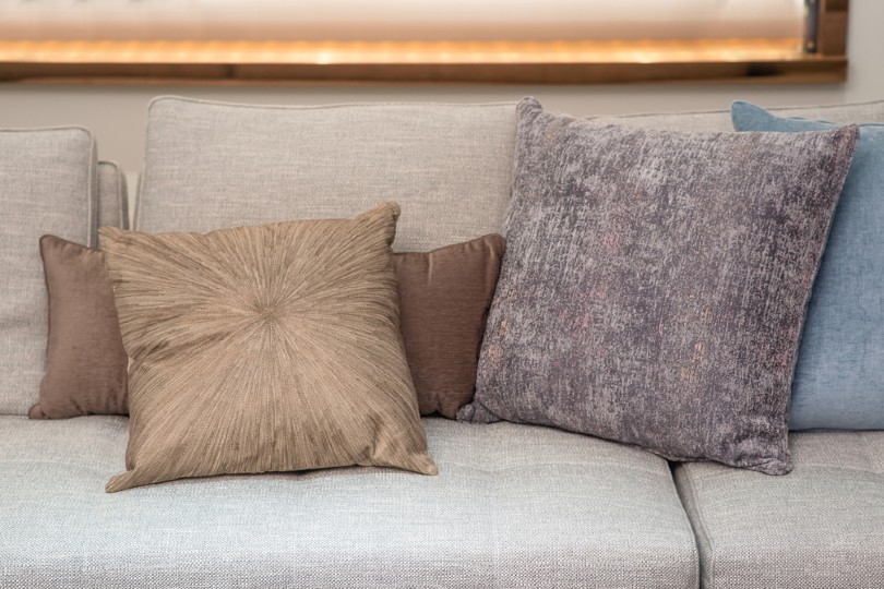 soften pillow decor on the grey sofa