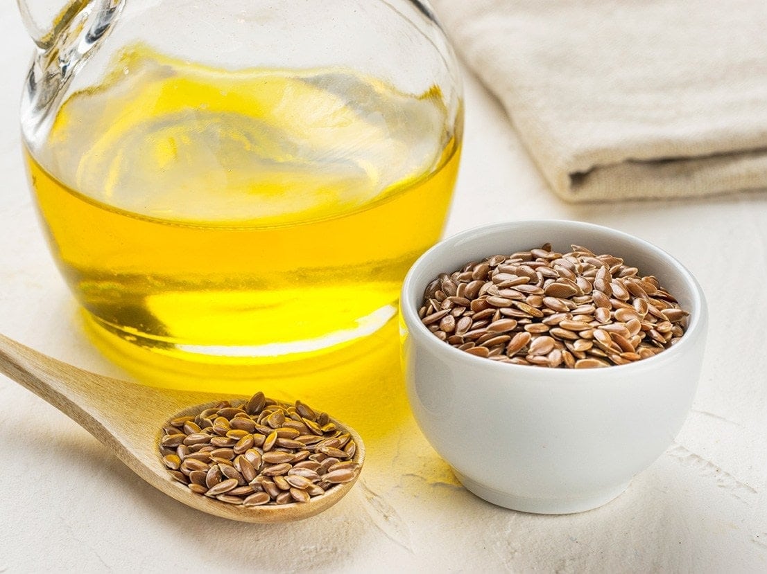 brown flaxseeds and flaxseed oil
