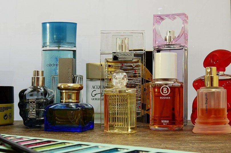 different perfumes on a table