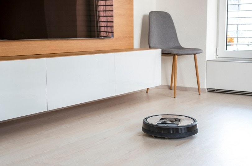robot vacuum cleaning the living room