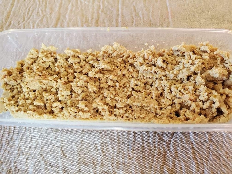 smalls cat food in a plastic container