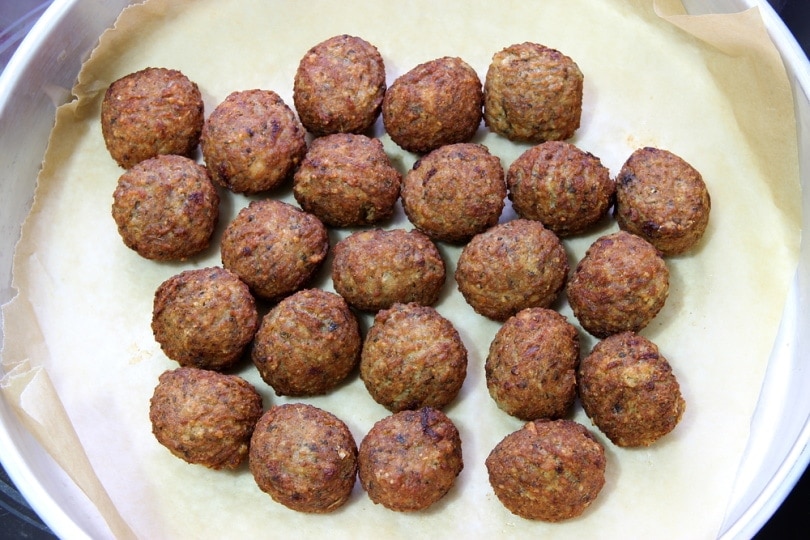 Baked chicken balls in a deep serving dish