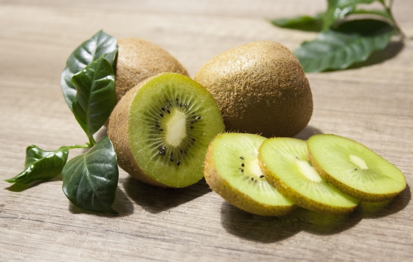 kiwi fruit on wooden table