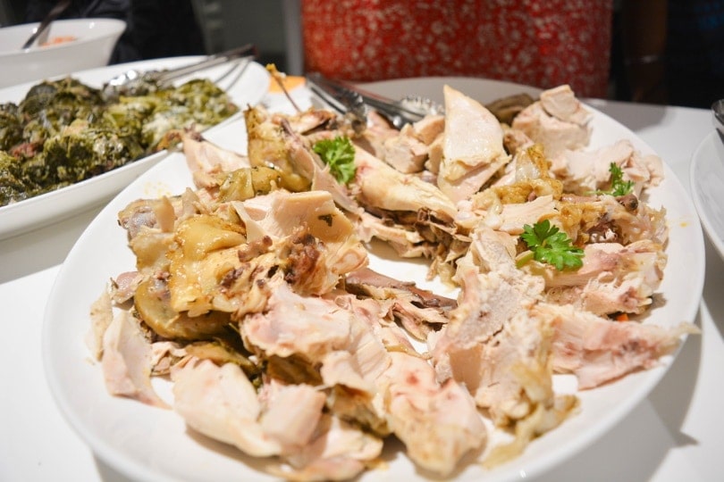 Cooked chicken with fresh herbs