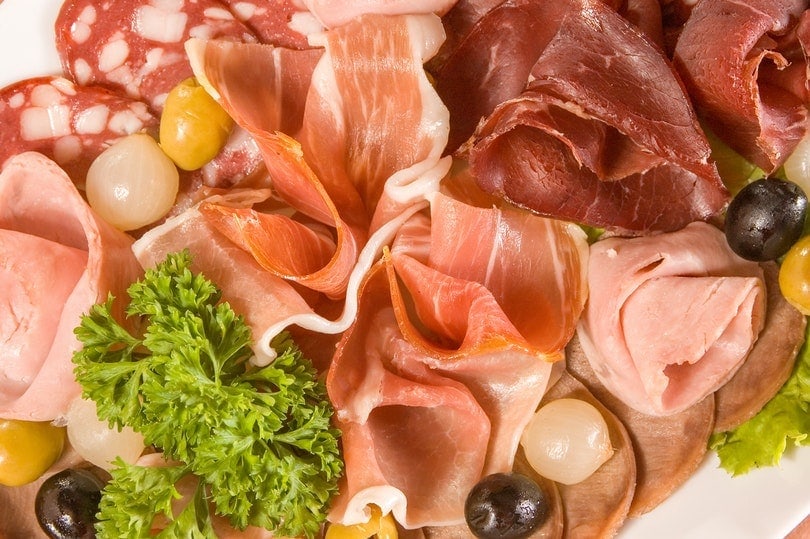 prosciutto meat in a charcuterie
