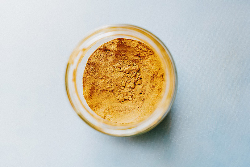 turmeric powder in a glass container