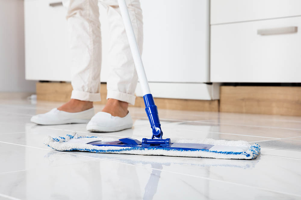 cleaning the floor with mop
