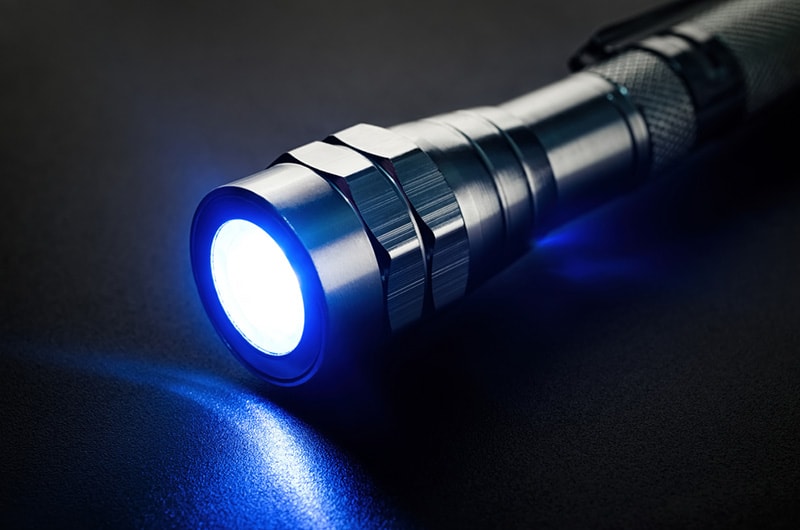 The UV light black light flashlight glows in the dark