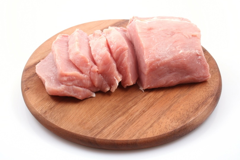 pork meat on wooden board