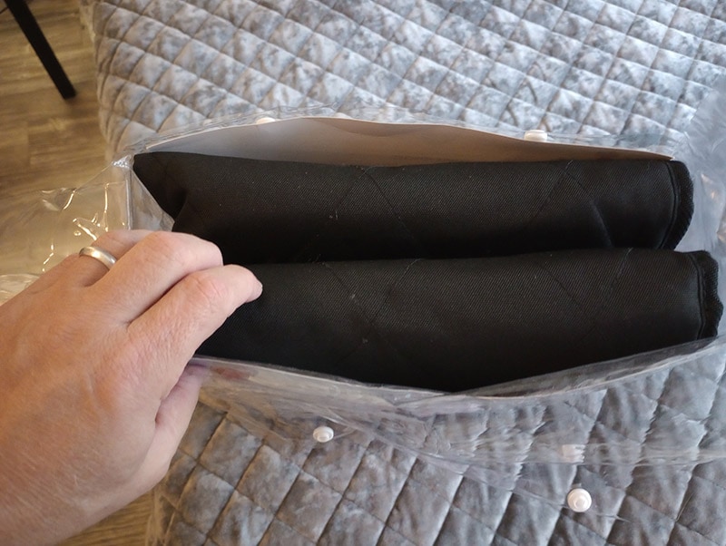 4knines split rear car seat cover in its plastic packaging