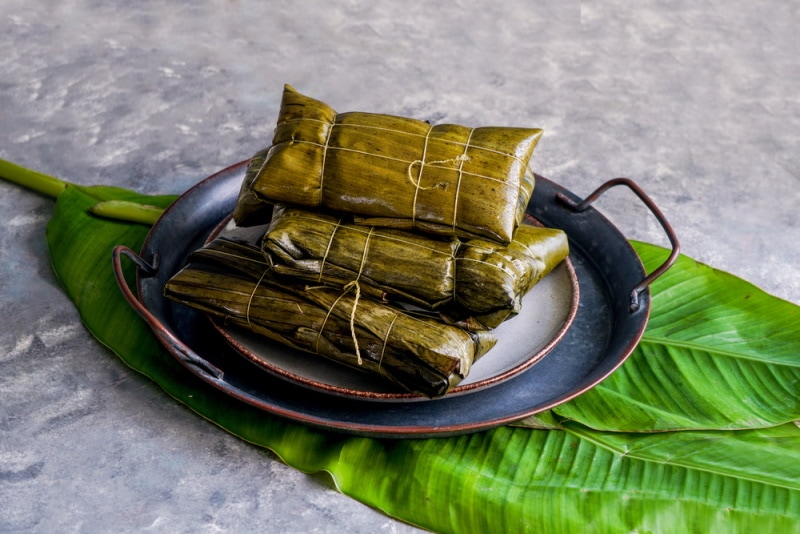 tamales on metal plate