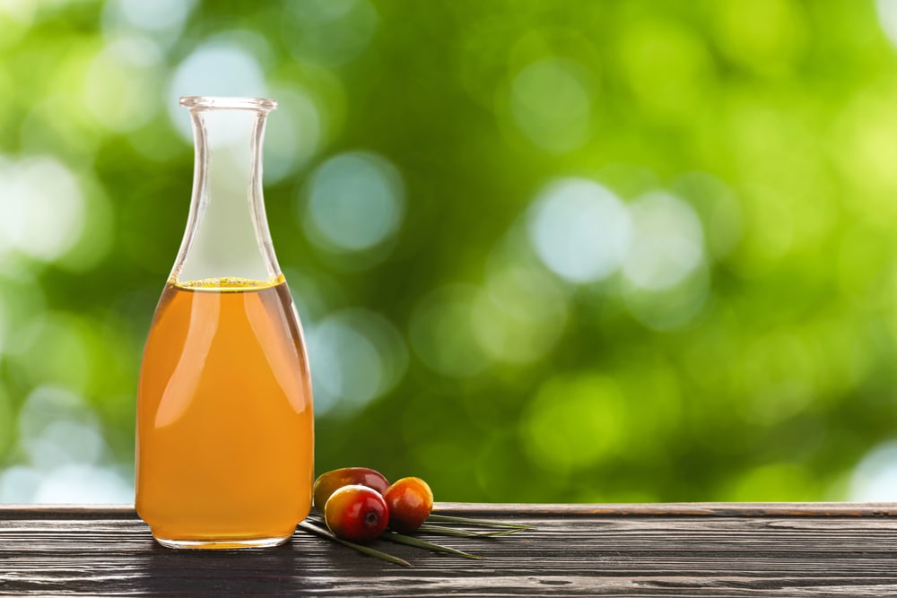 Palm oil in glass bottle