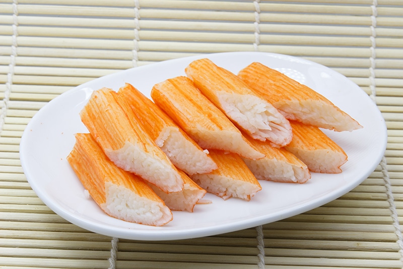 a plateful of imitation crab sticks