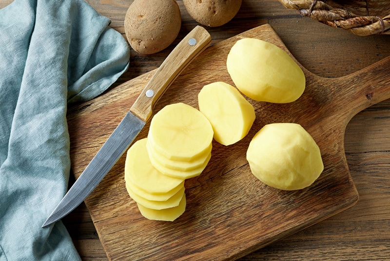 fresh raw peeled sliced potatoes