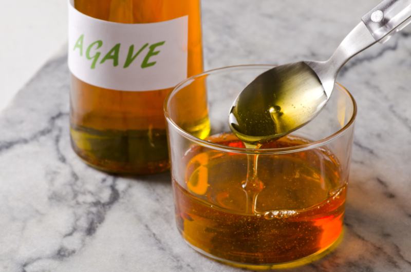Agave Syrup pouring on a glass