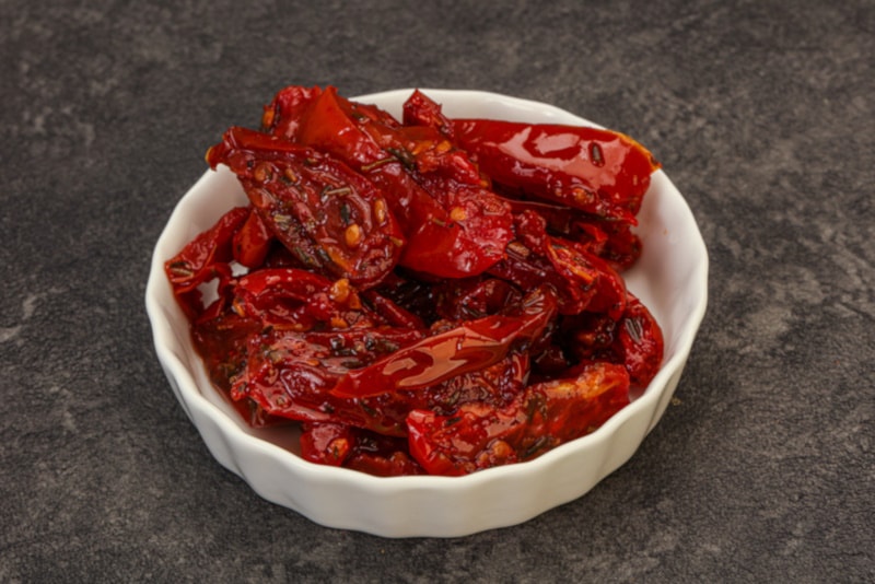 Sun-dried tomatoes with olive oil and herbs