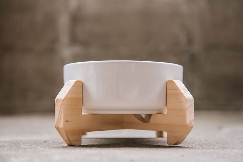 Wooden custom display for pet food bowl
