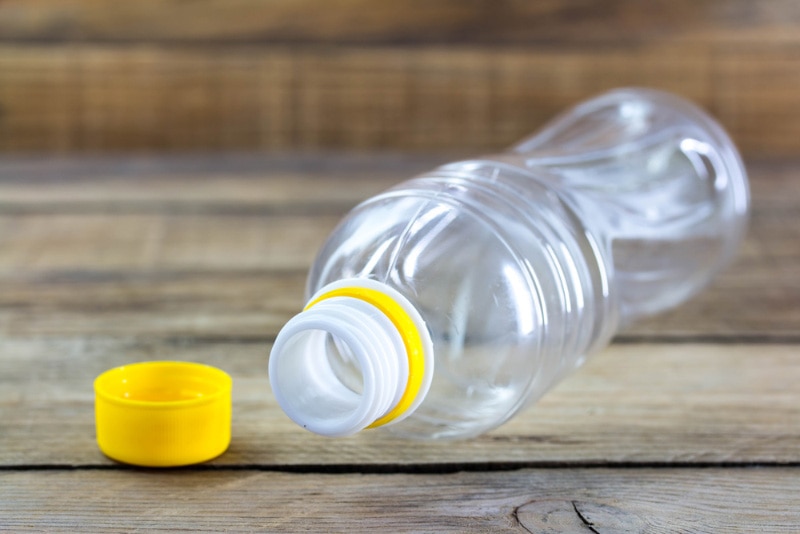 empty water bottle on wooden background