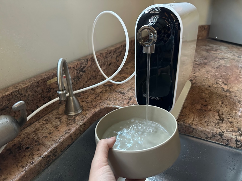 Brondell Cypress Three-Stage Countertop Water Filtration System - getting water from the product
