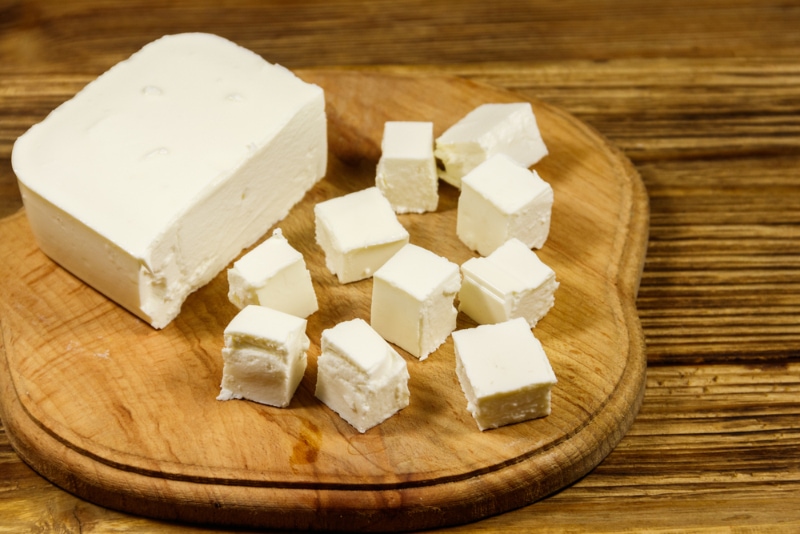 Feta cheese on cutting board