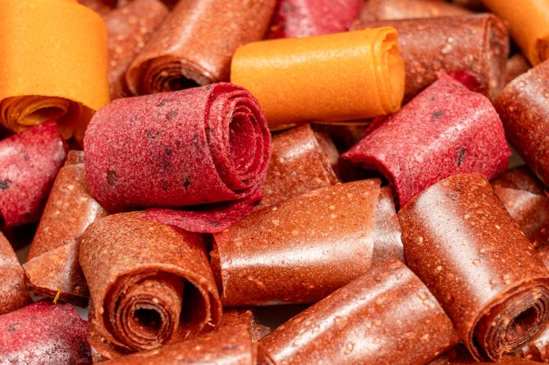 Rolls of dried fruit leather perfect for eating as healthy snack