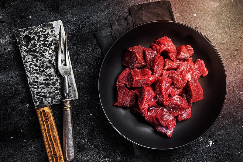 diced raw elk meat on a plate