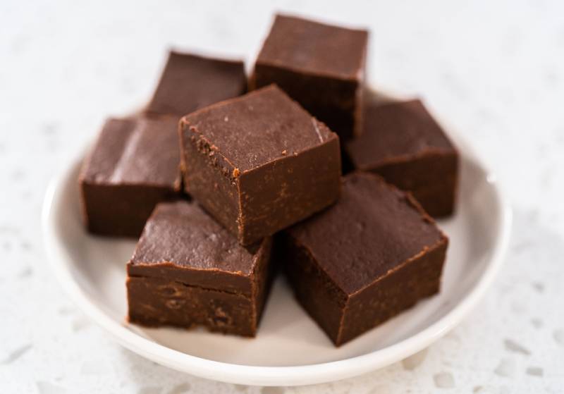 fudge pieces on a white ceramic plate