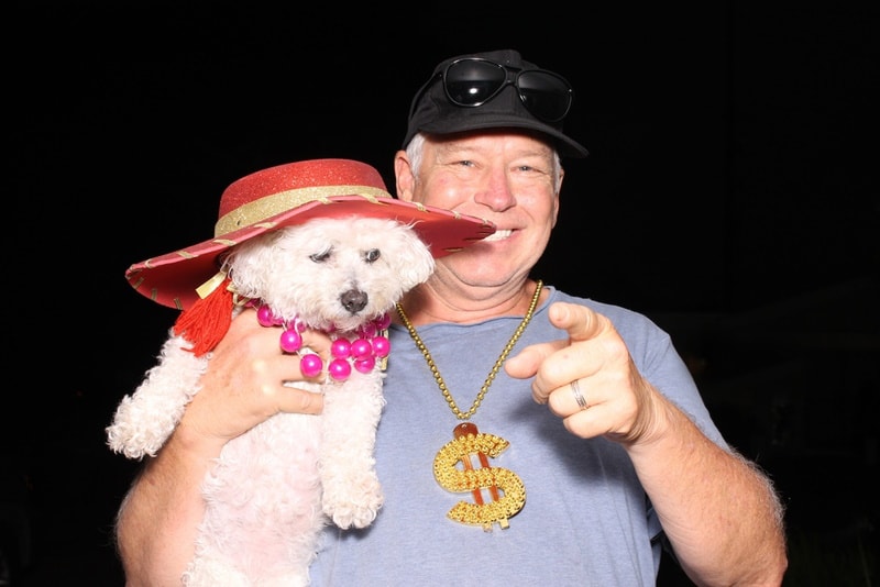 man and his dog in photo booth