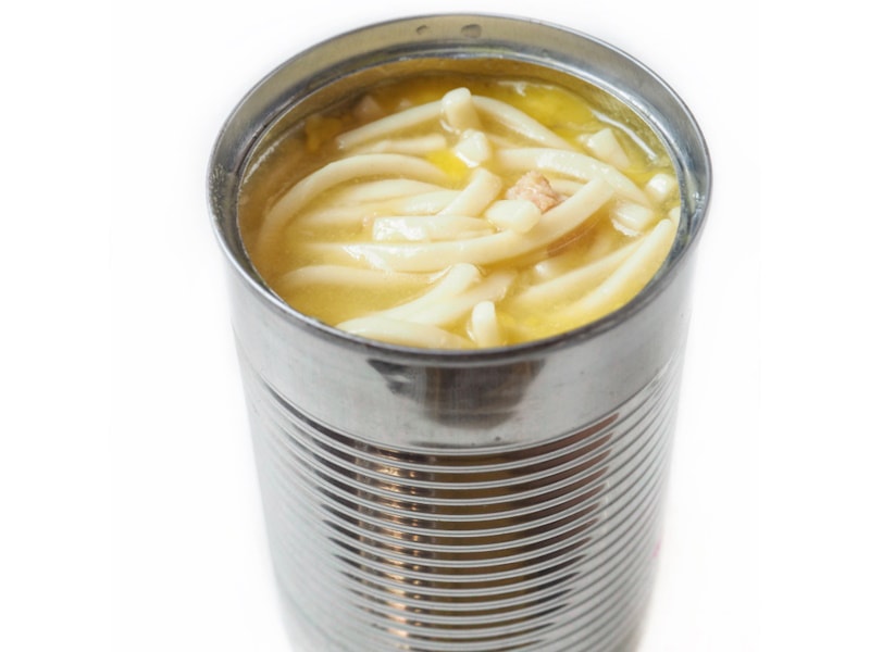 Open can of unlabeled chicken noodle soup