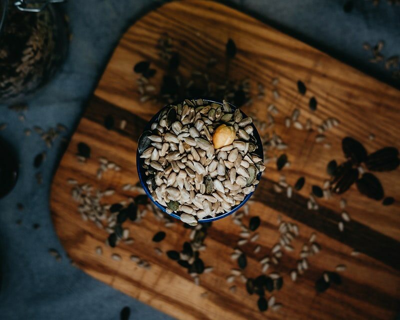cup filled with pumpkin seeds