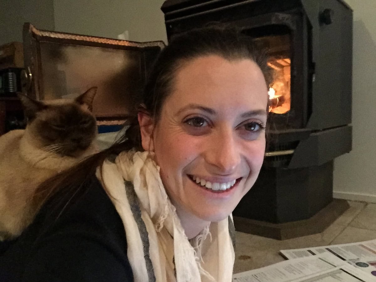 Baby and I by the fire in our first home, being on my back brought him that tiny bit closer to the heat.