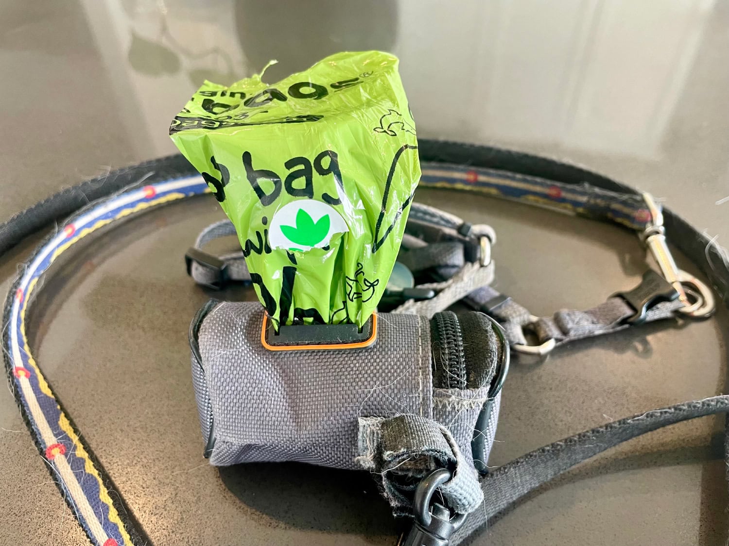 The Original Poop Bags Review - poop bag on leash