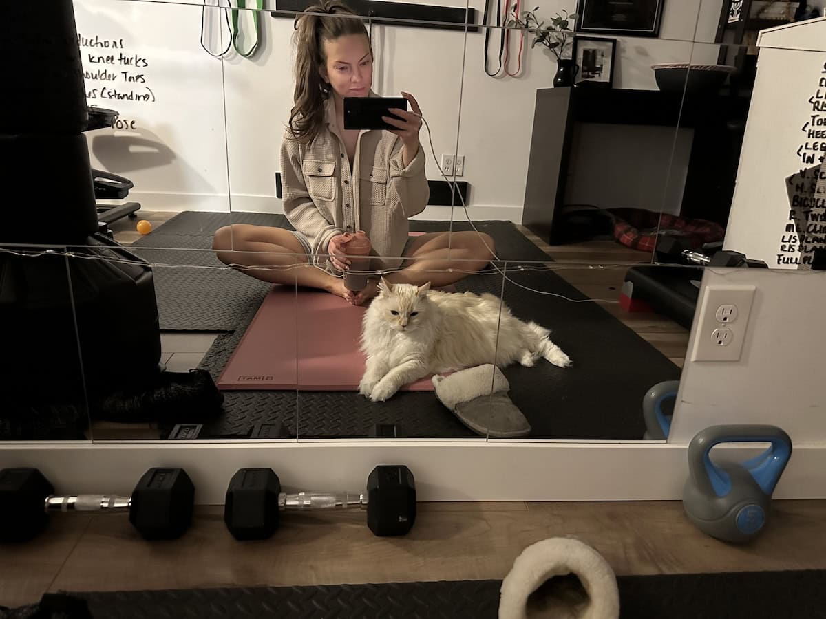 Blue helping Amanda in the yoga studio